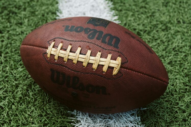 An image of a football on a field.